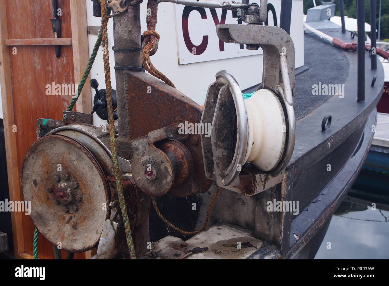 Pulleys and ropes on board a small fishing boat Stock Photo Alamy