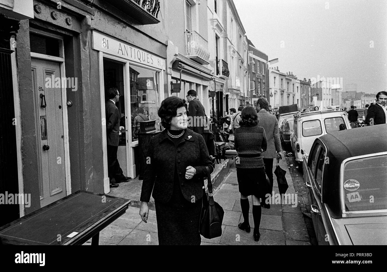 Swedish opera star Birgit Nilsson brows the bric-brac and antiques at the Portobello Road Market in Notting Hill London in 1970 Stock Photo