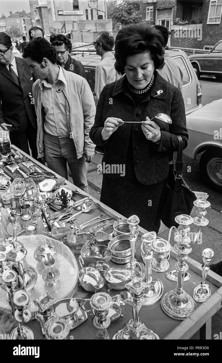 Swedish opera star Birgit Nilsson brows the bric-brac and antiques at the Portobello Road Market in Notting Hill London in 1970 Stock Photo