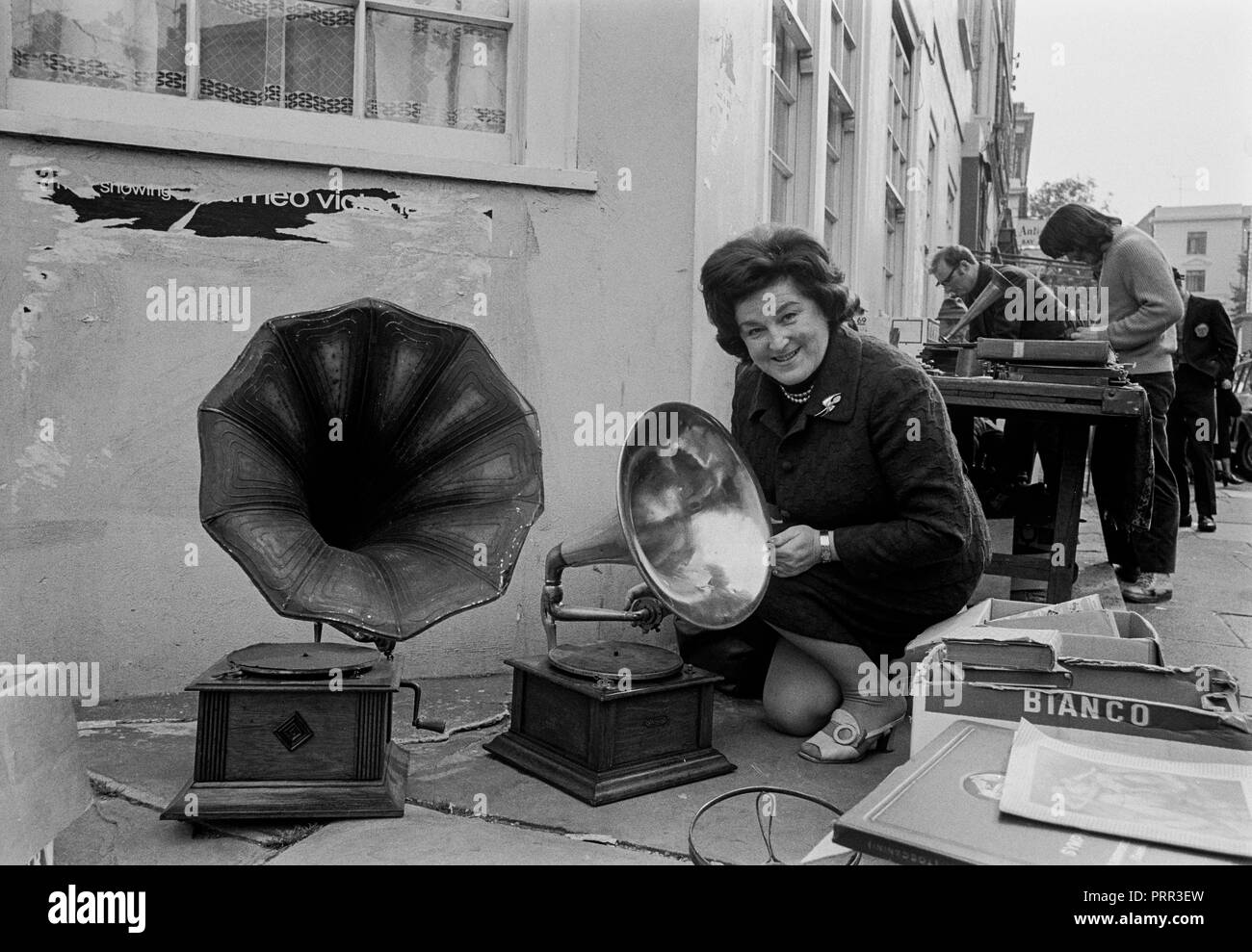 Swedish opera star Birgit Nilsson brows the bric-brac and antiques at the Portobello Road Market in Notting Hill London in 1970 Stock Photo