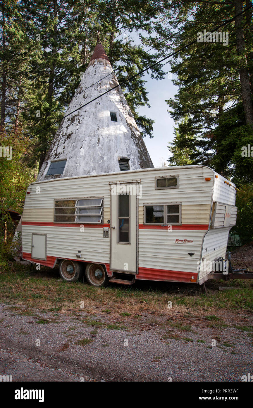 Travel trailer and cement tipee at roadside near Flathead Lake, Montana Stock Photo