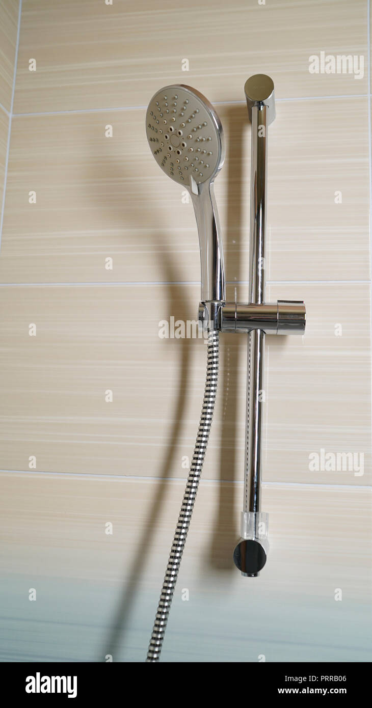 shower and shower holder. modern chrome shower attachment with thermostatic controller Stock Photo