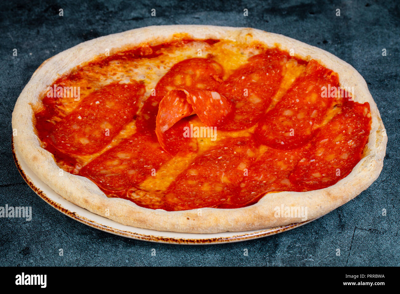 Famous Pizza pepperoni with cheese Stock Photo Alamy