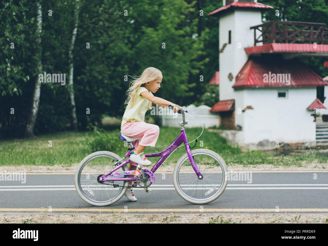child riding bicycle