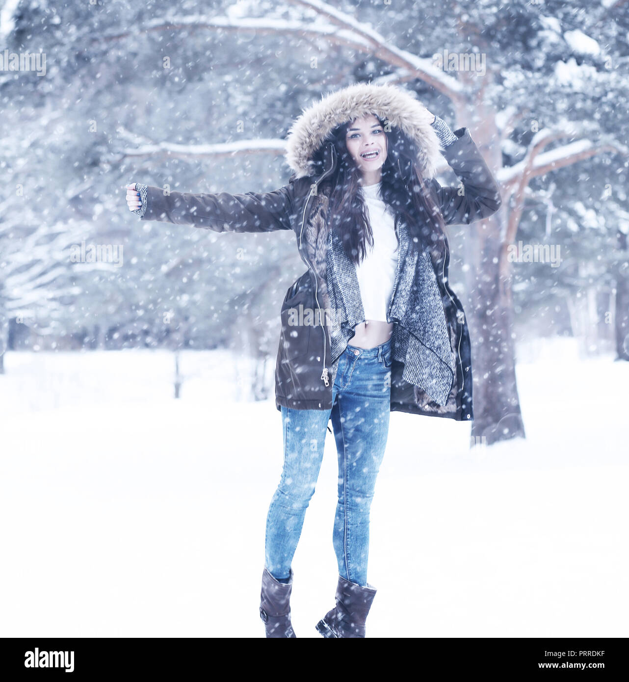Beautiful girl in a beautiful winter snow Stock Photo - Alamy
