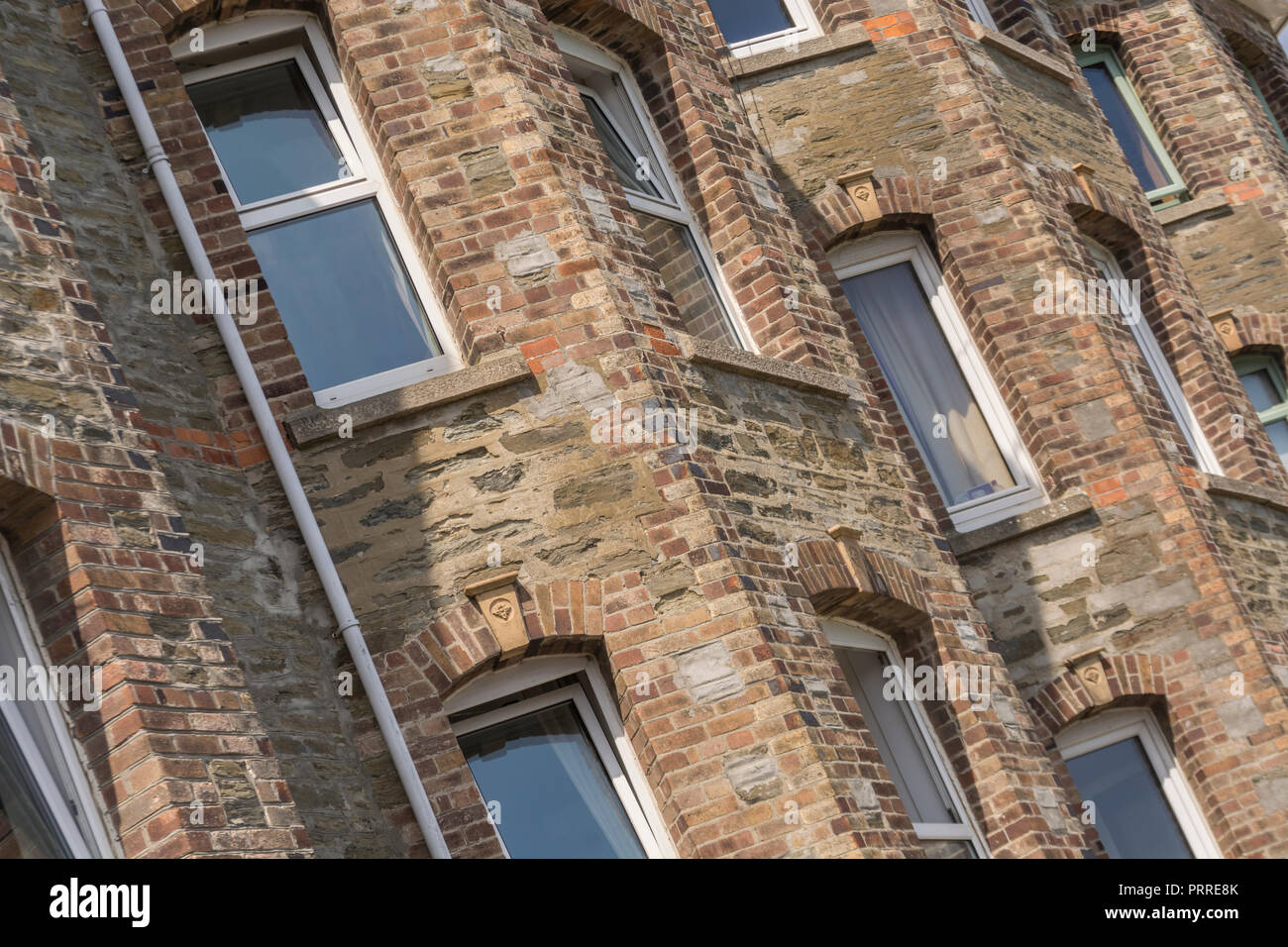 Rear part of block of flats in Newquay, Cornwall. For generation rent', getting on the housing ladder, rent concept, UK house rental, home ownership. Stock Photo