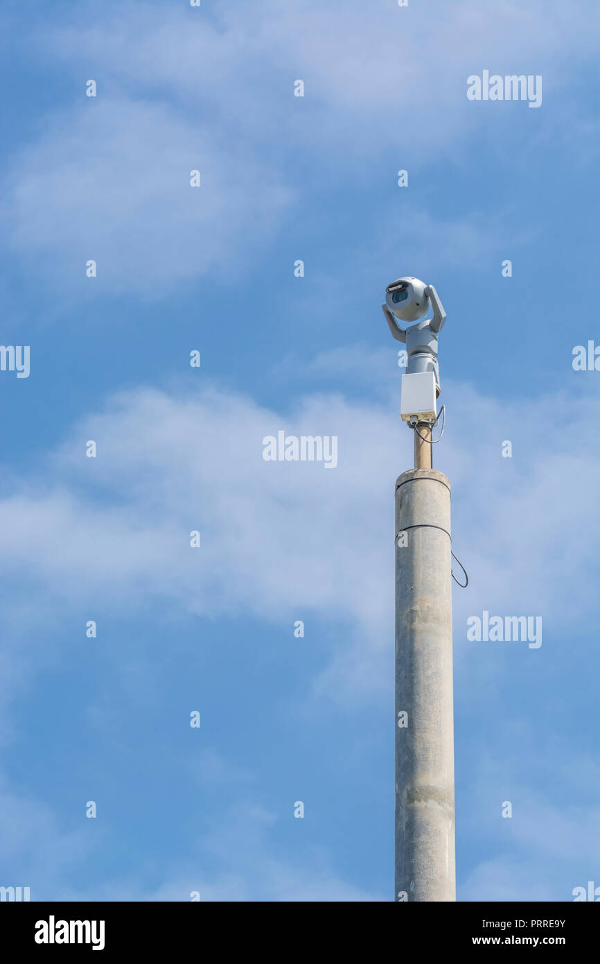 CCTV camera in centre of Newquay town. Crime prevention metaphor