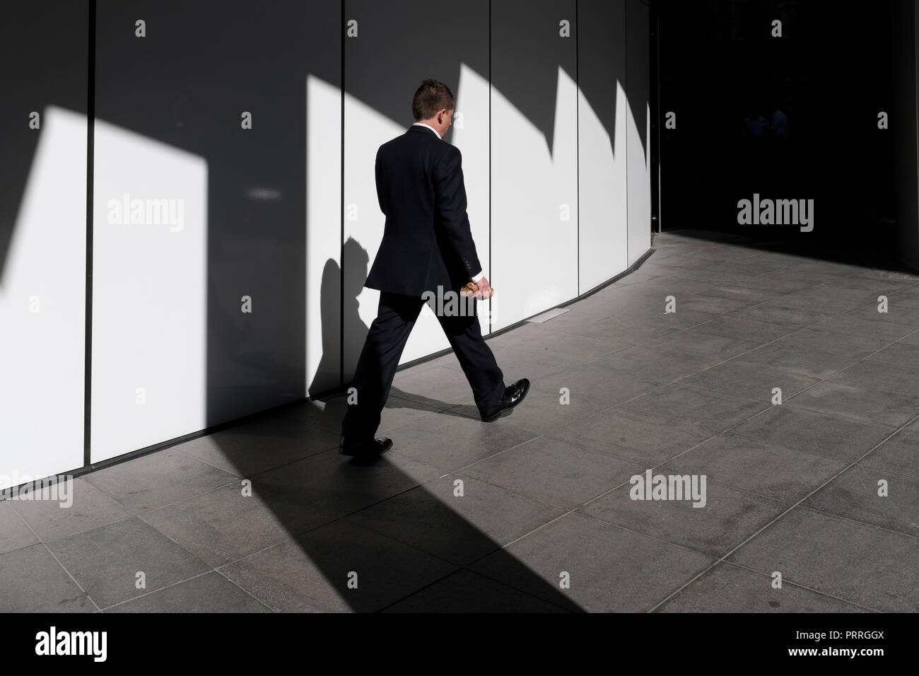 England,London,The City of London- office worker, businessman going to work. Stock Photo