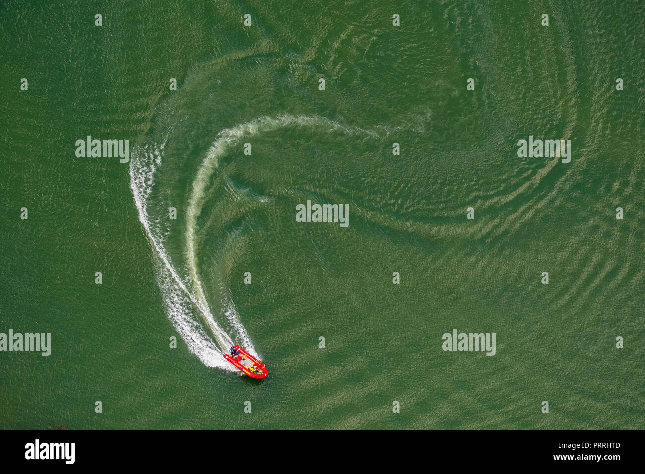 Motorboat, lifeboat on Lake Feldmarksee, near Sassenberg, Münsterland, North Rhine-Westphalia, Germany Stock Photo