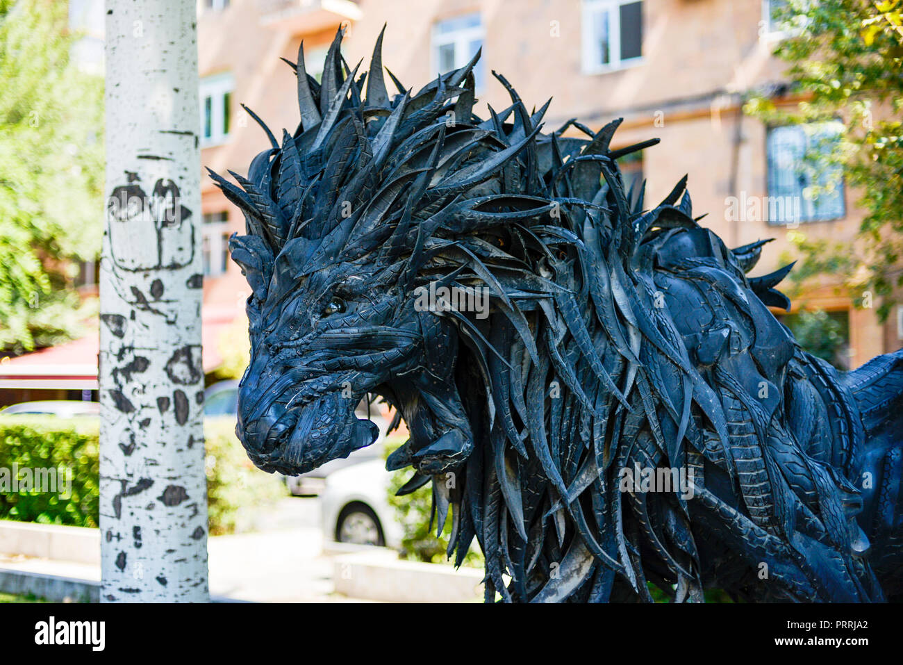 A lion roars in the sculpture garden in the Armenian capital of Yerevan