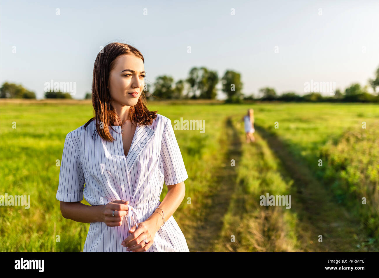 Young beautiful woman in rays hi-res stock photography and images - Alamy