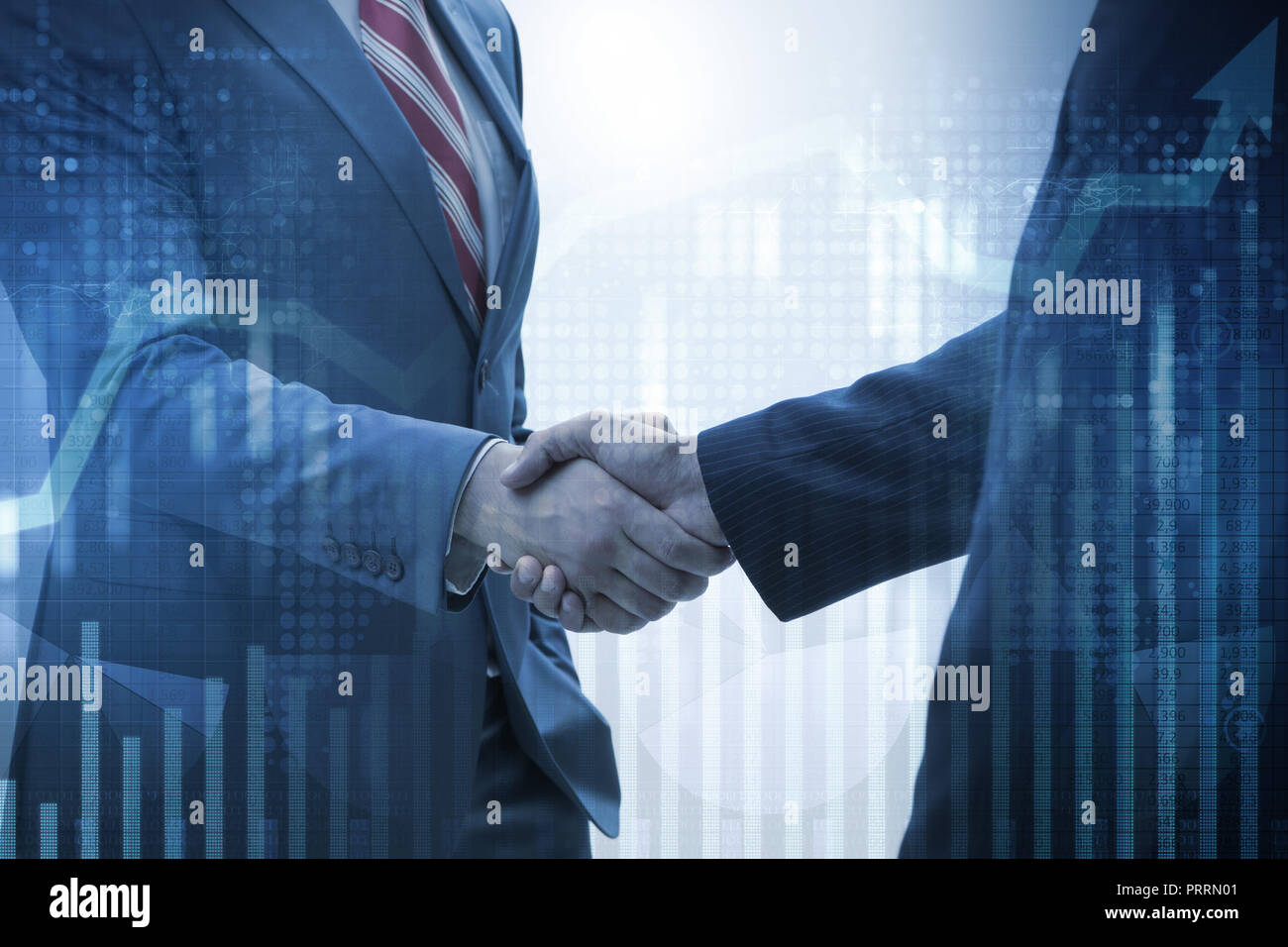 Business concept of cooperation with handshake Stock Photo - Alamy