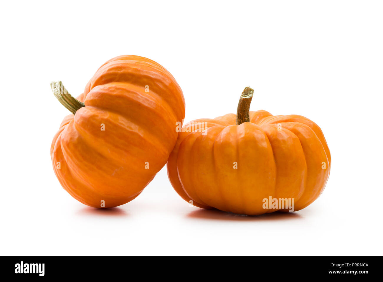 Fresh orange miniature pumpkin isolated Stock Photo