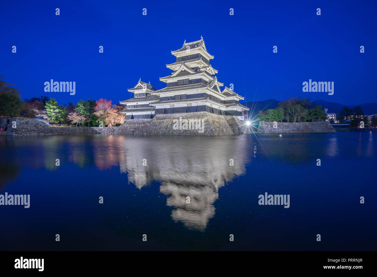 Matsumoto Castle at night with reflection in Nagano, Japan. Stock Photo