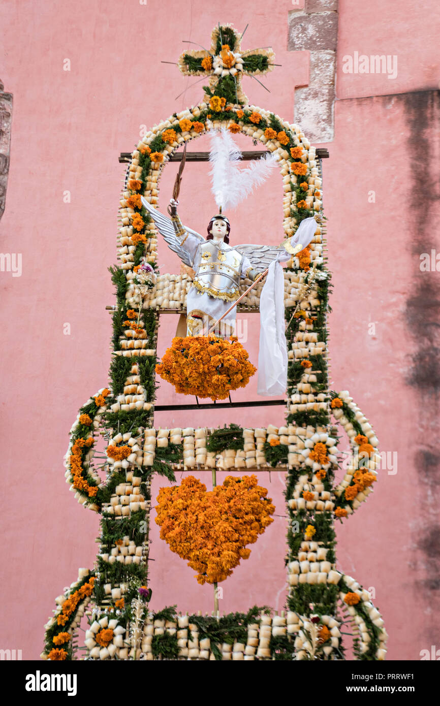 Giant Xuchiles, complex braided offerings made from called agave fibers and marigolds, on display at the Parroquia San Miguel Archangel Church celebrating the cities patron saint during the Feast of Saint Michael September 30, 2018 in San Miguel de Allende, Mexico. The festival is a four-day long event with processions, parades and a late night fireworks battle. Stock Photo