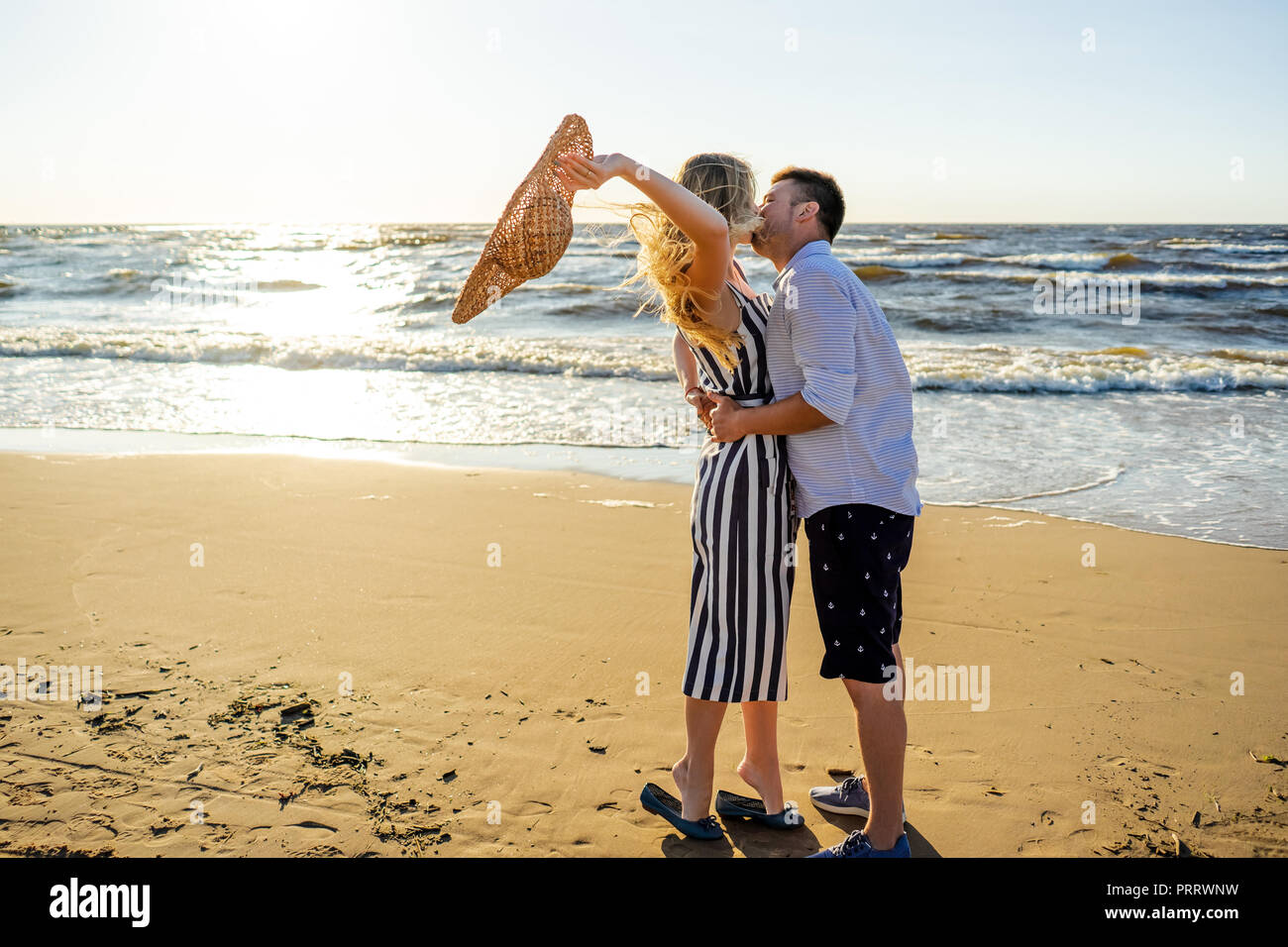 Young couple in love kissing hi-res stock photography and images - Alamy