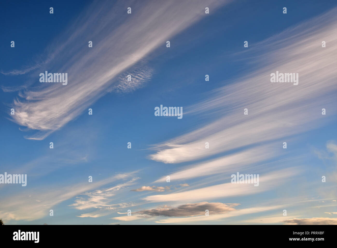 Sweeping wind blown clouds Stock Photo Alamy