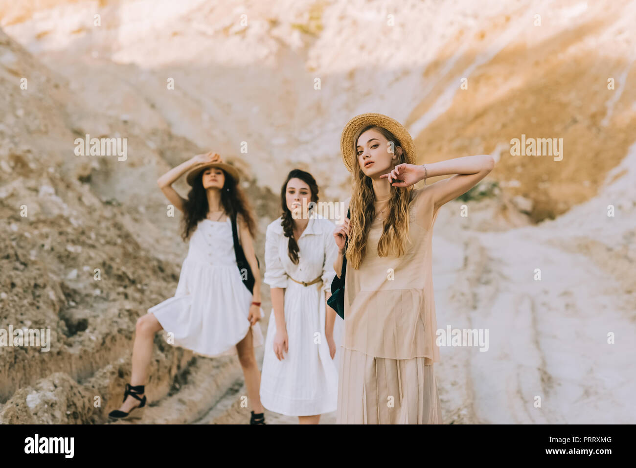 Three girls posing hi-res stock photography and images - Alamy