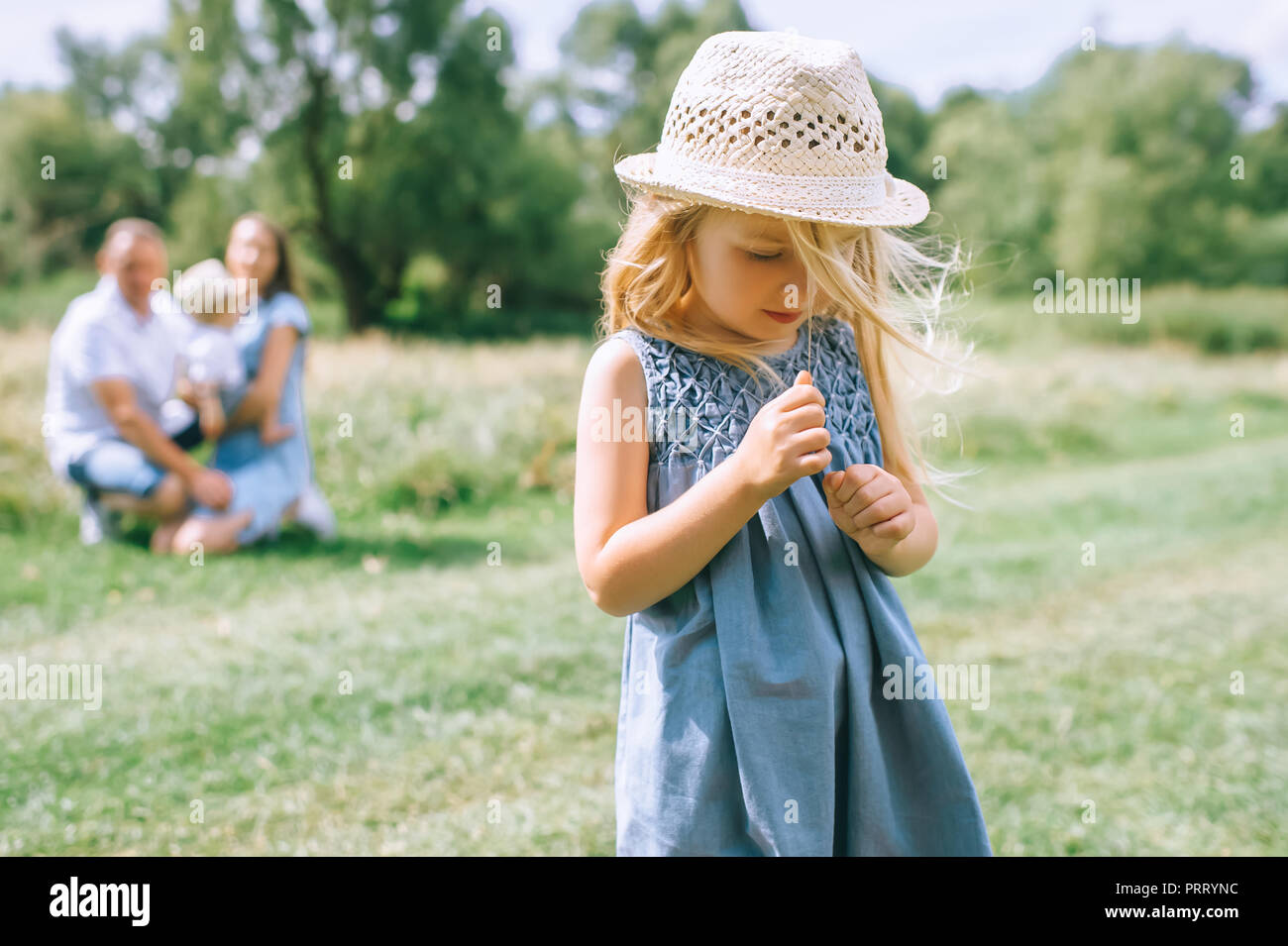 Toddler with Blonde Hair and Straw Hat - wide 7
