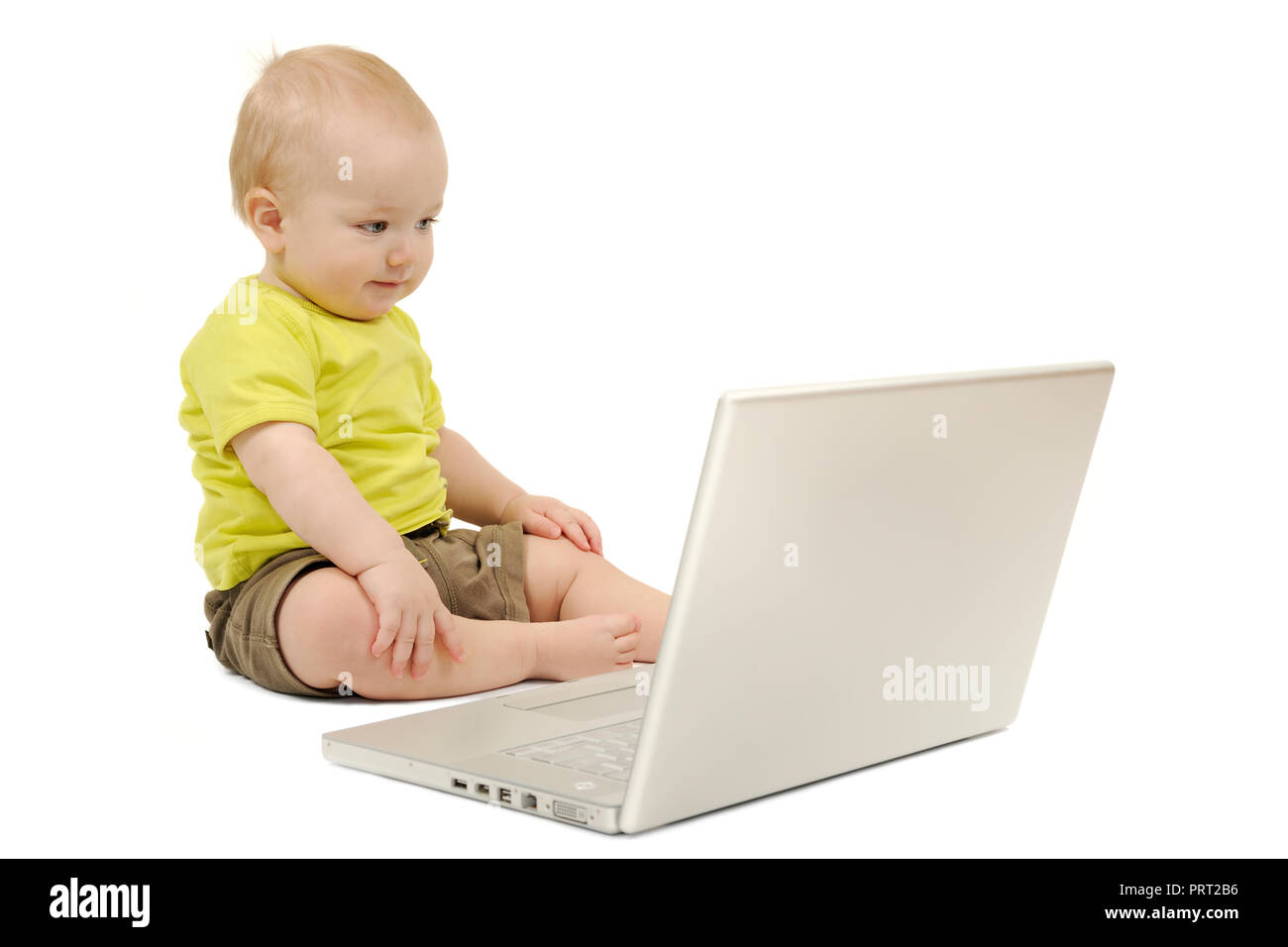 Little boy with a laptop on white background, isolated Stock Photo - Alamy