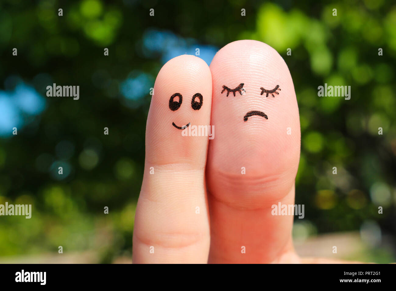 Finger art of couple. The concept man is thin, woman is fat. Stock Photo