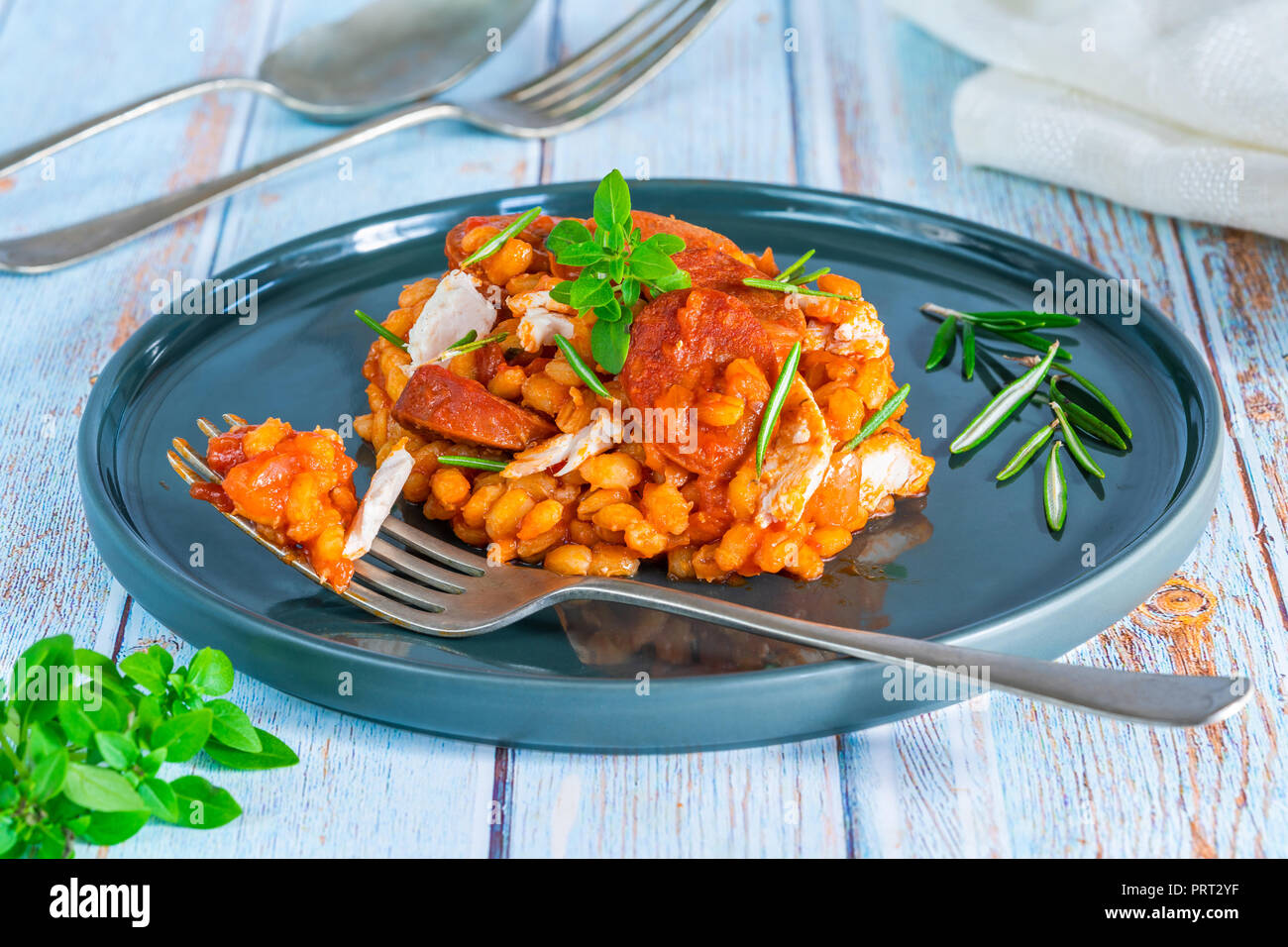 Chorizo, chicken and rosemary pearl barley risotto - top view Stock Photo