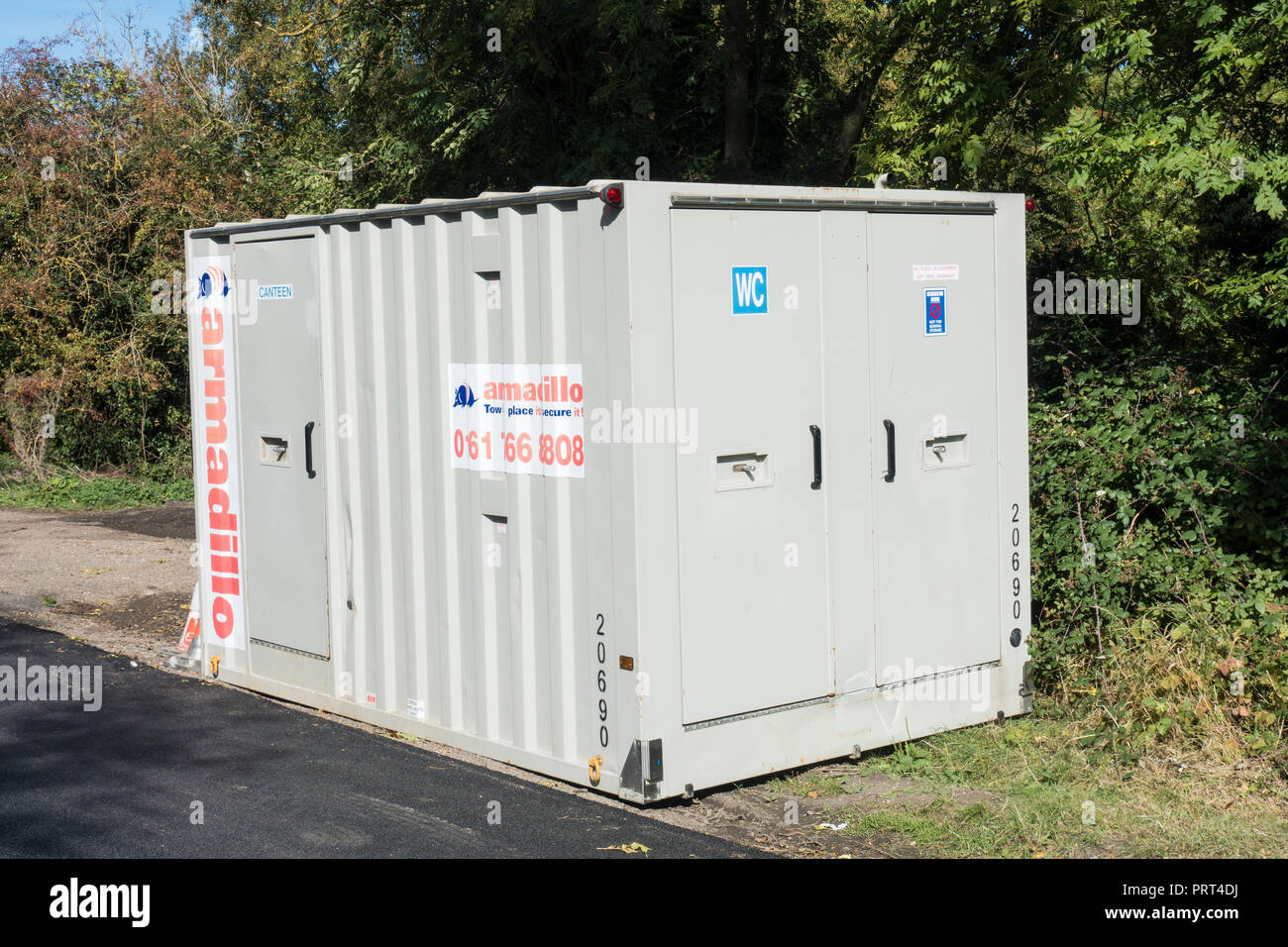 Road workers canteen and toilet cabin Stock Photo