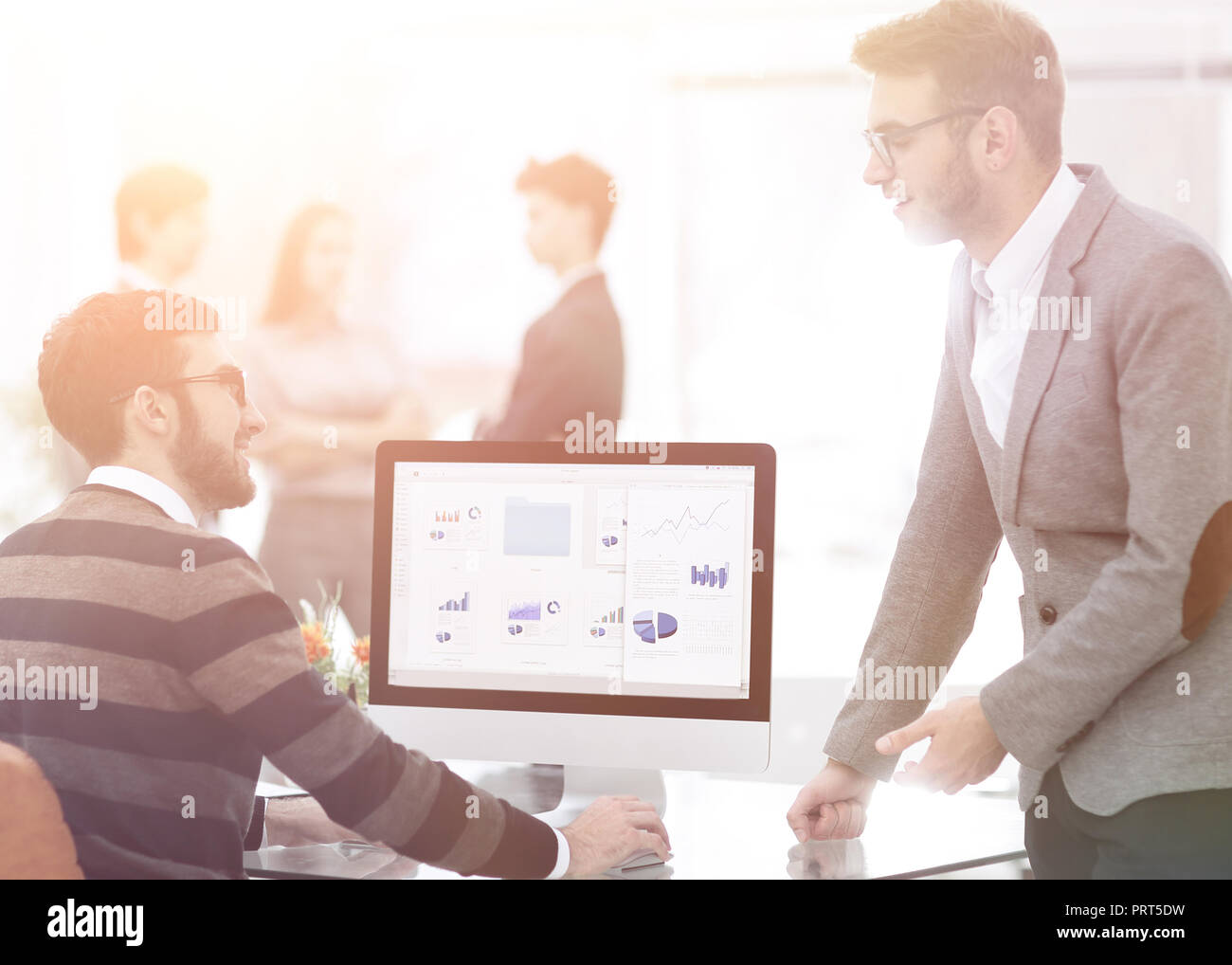 two businessmen analyzing stats financial data Stock Photo