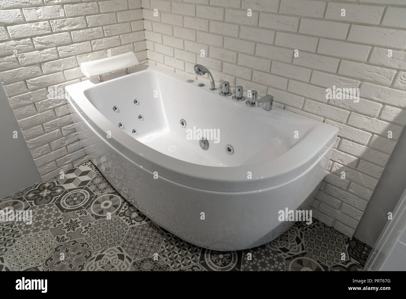 modern domestic bathroom interior with hydromassage bath Stock Photo