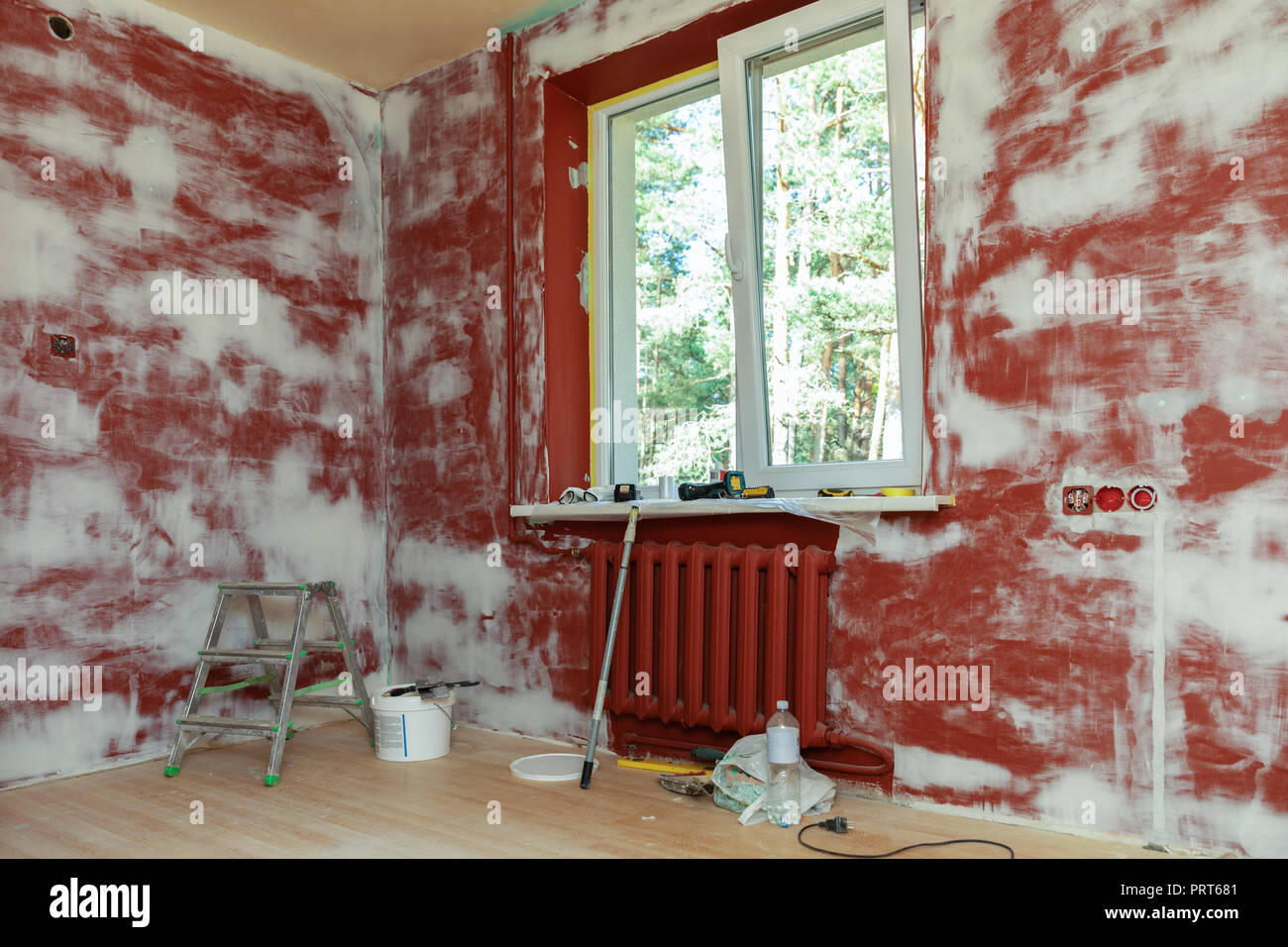 home improvement - house room under construction plastered walls Stock Photo