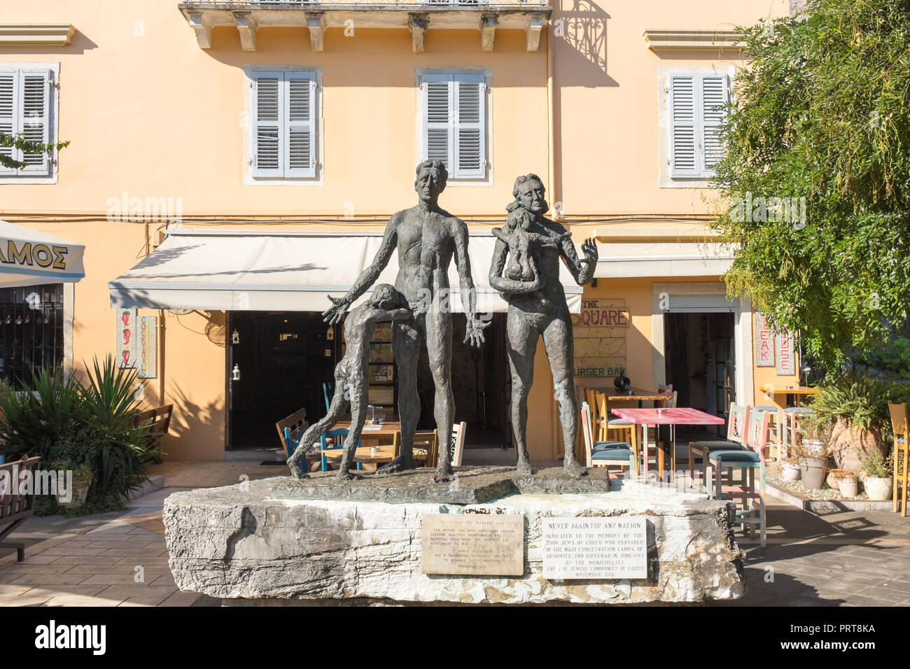 'Never Again For Any Nation' a bronze sculpture of a family dedicated to the 2000 Corfu Jews who died in concentration camps in Corfu Town Stock Photo