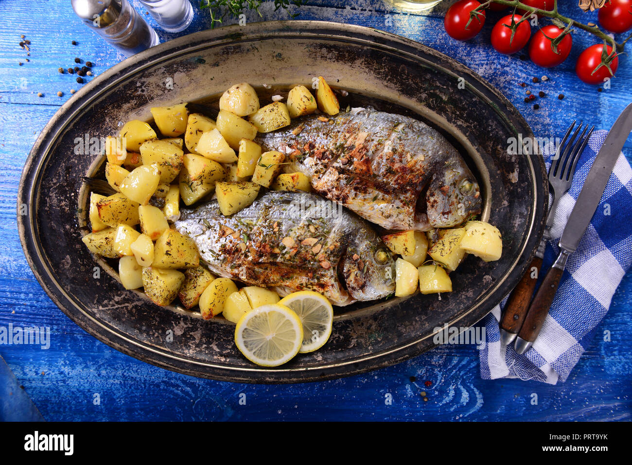 Fried bream fish with potatoes Stock Photo Alamy