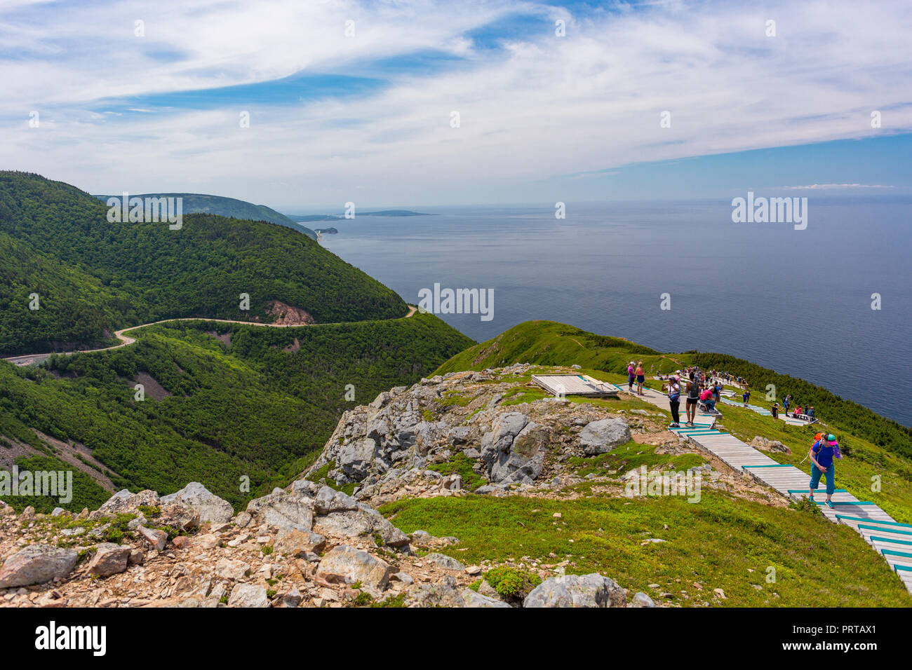 CAPE BRETON, NOVA SCOTIA, CANADA Hikers on boardwalk on Skyline Trail