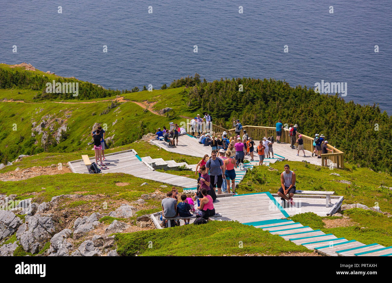 CAPE BRETON, NOVA SCOTIA, CANADA Hikers on boardwalk on Skyline Trail