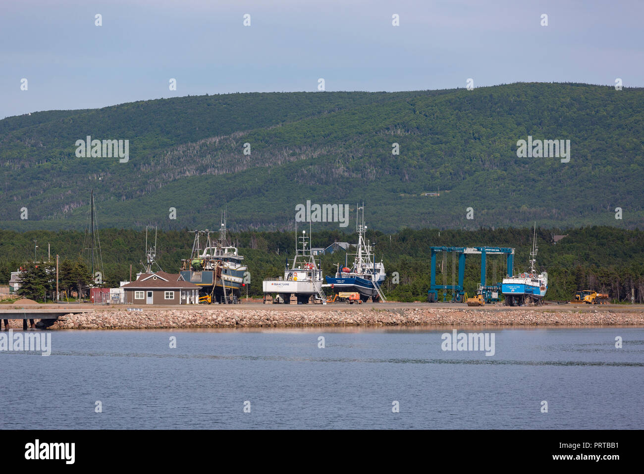 CHETICAMP, NOVA SCOTIA, CANADA Fishing boats in drydock, on Cape