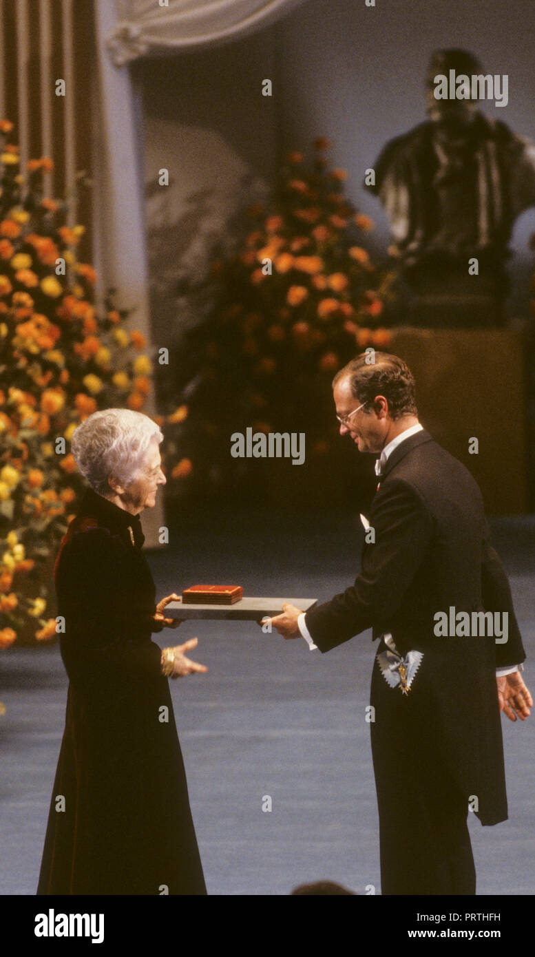 RITA LEVI MONTALCINI Italian Nobel Laureate in medicine receives the prize from the SWedish King Carl XVI Gustaf at Stockholm Consert hall .She was th Stock Photo