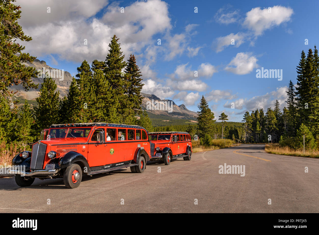 Historic vintage red jammer tour buses parked at Marais Pass Stock Photo