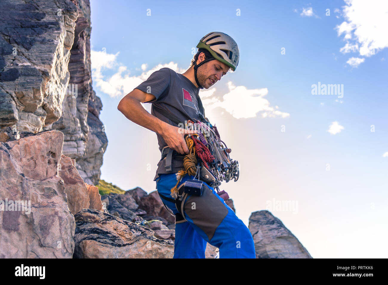 Young man rock climbing hi-res stock photography and images - Alamy