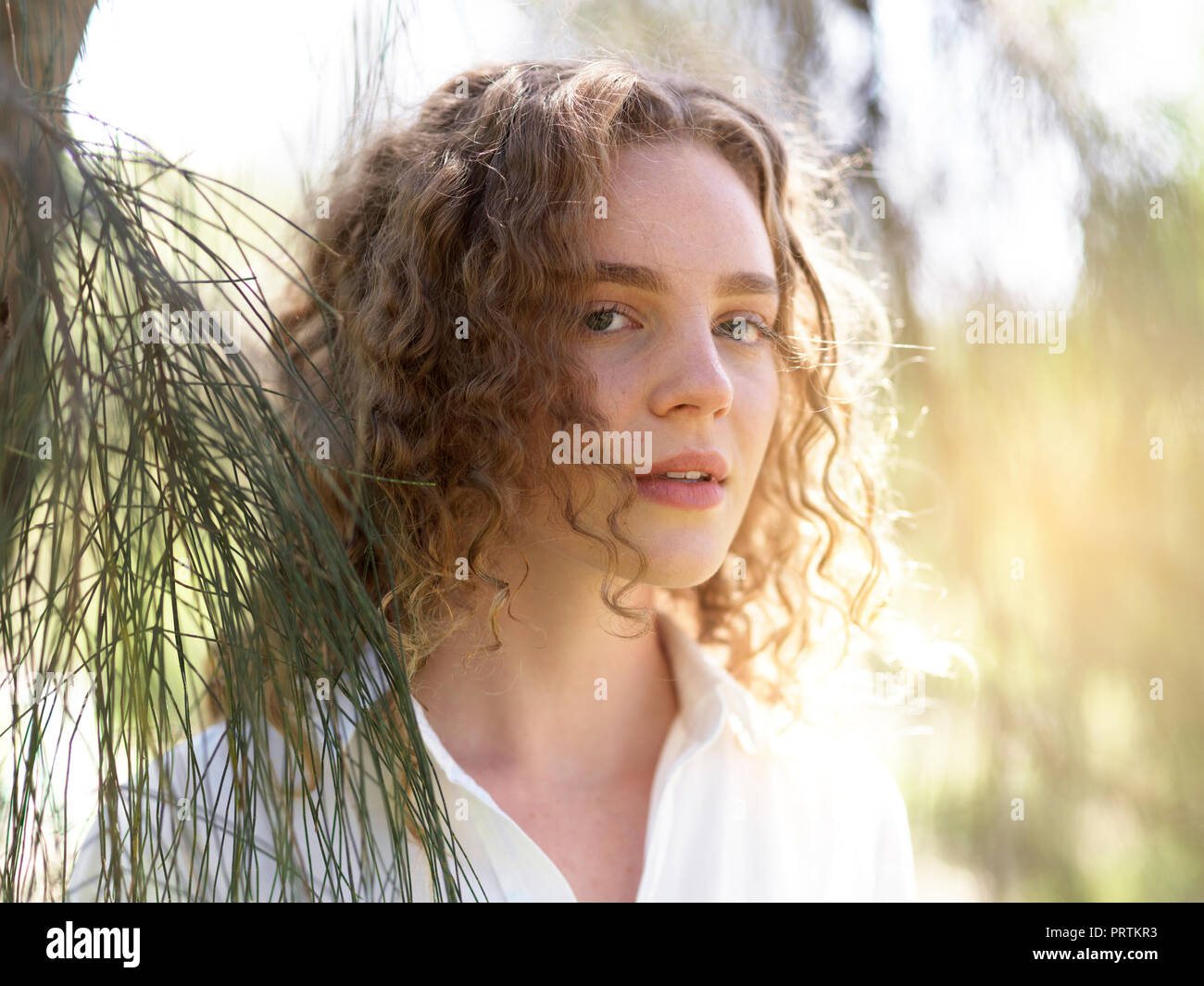 Portrait of young woman in nature Stock Photo