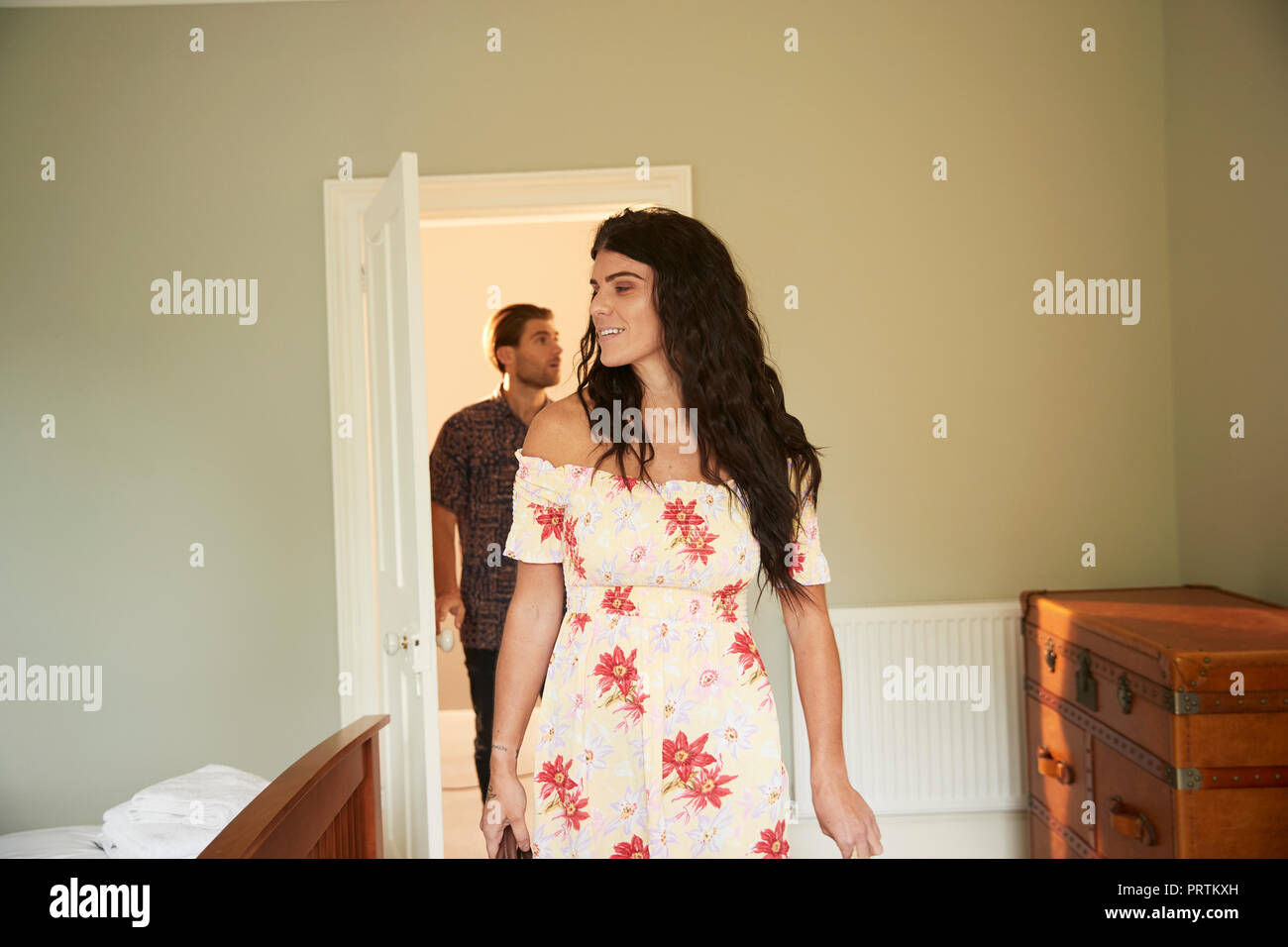 Couple entering bedroom hi-res stock photography and images - Alamy