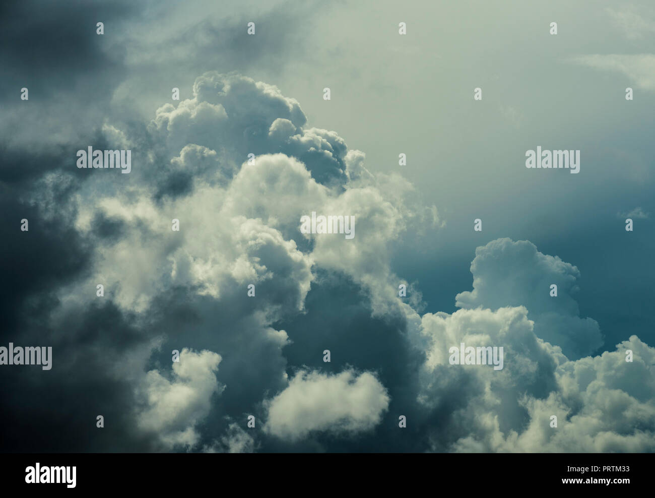 Huge clouds growing rapidly into thunderstorms Stock Photo