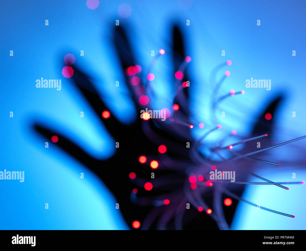 Digital age: artificial intelligence fibre optics carrying data passing through hand Stock Photo