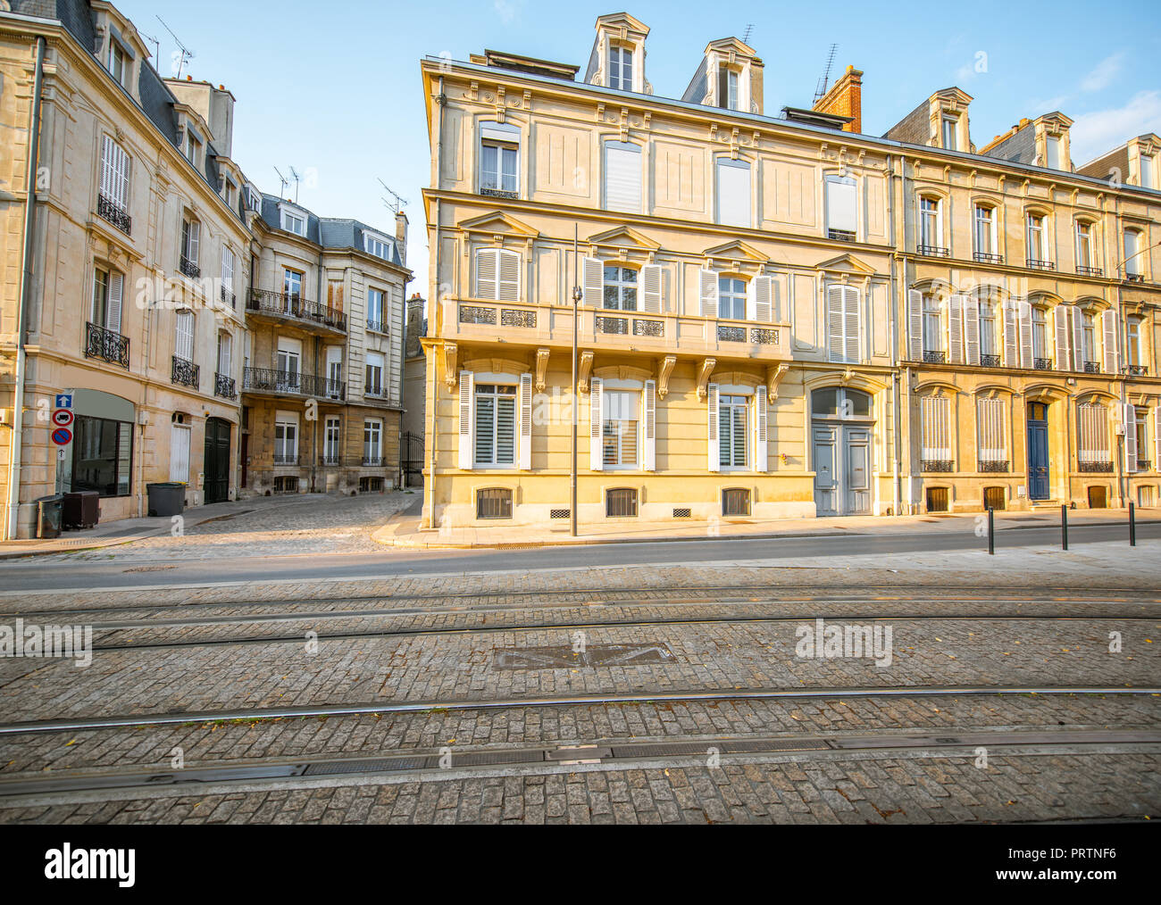 Street view with beautiful old buildings in Reims city in Champagne