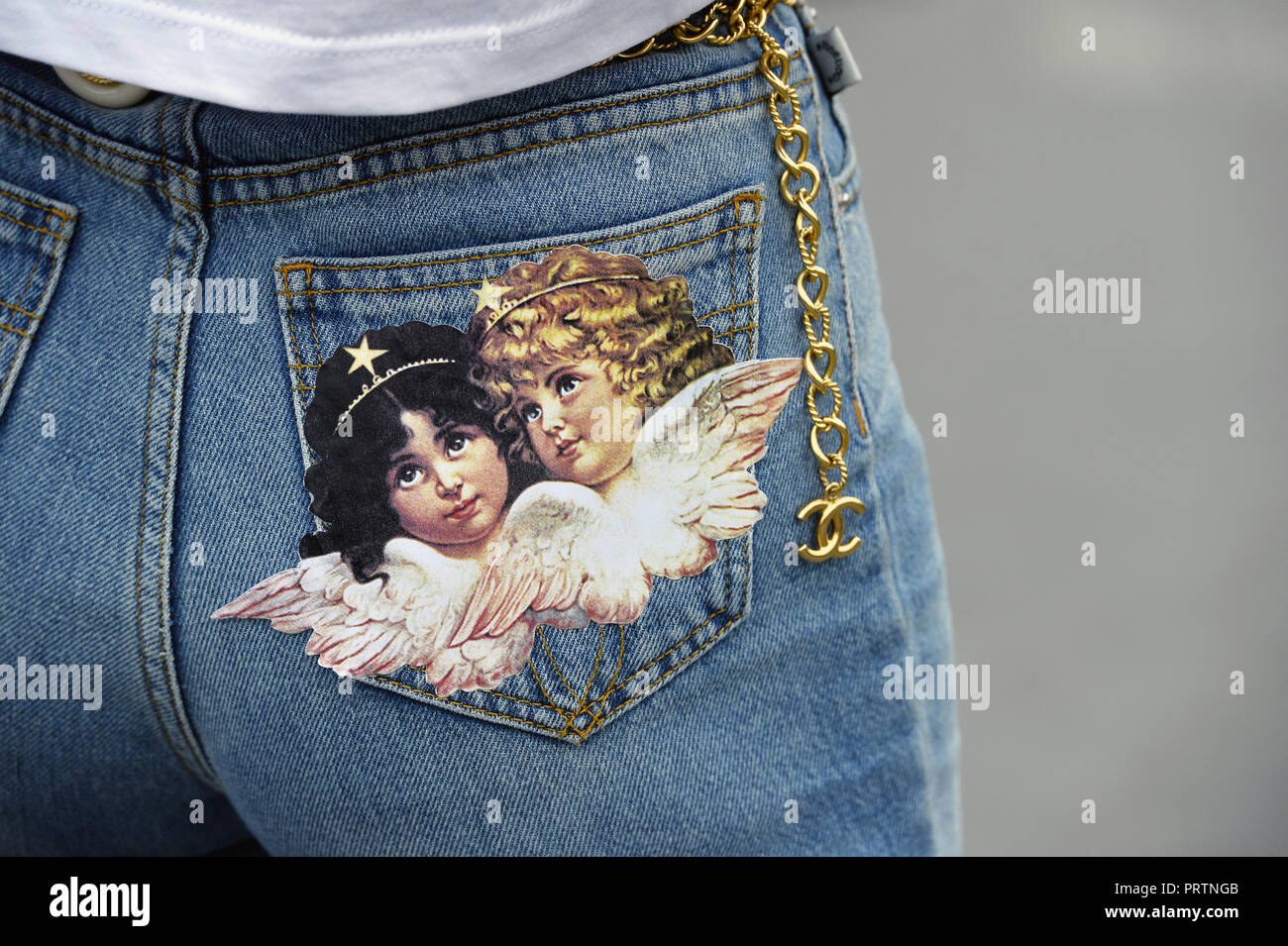 Jeans pocket with angels hi-res stock photography and images - Alamy