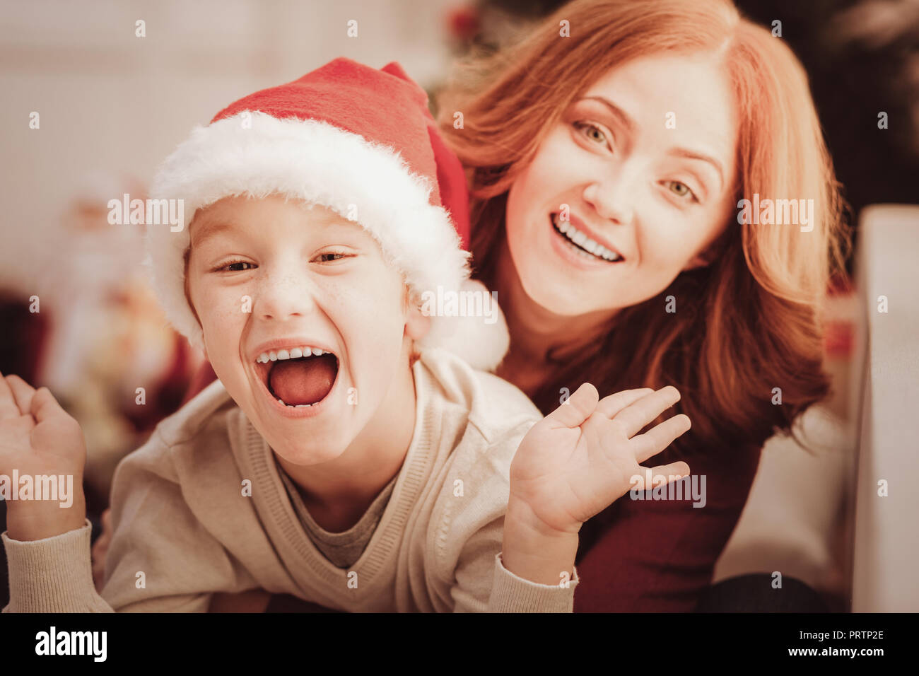 Close up of amused little child with his mother Stock Photo
