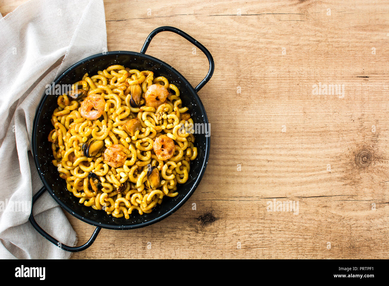 a spanish fideua, a typical noodles casserole with seafood Stock Photo -  Alamy