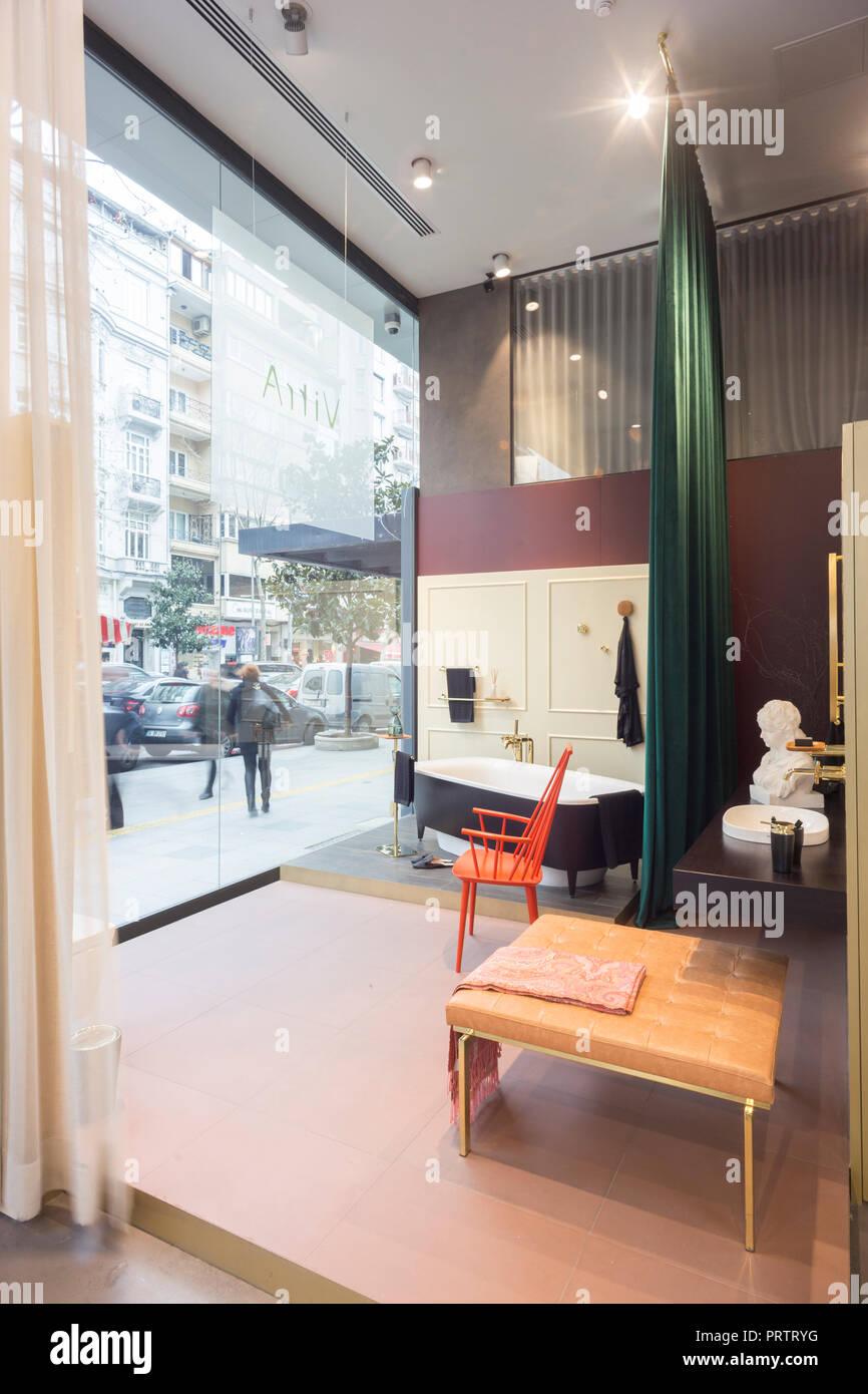 Furnitures store window display in a main street of a city centre Stock