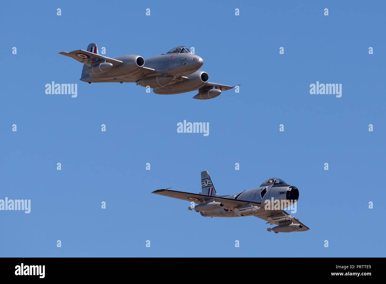 Gloster Meteor F.8 aircraft VH-MBX leading a CAC CA-27 Sabre (North American F-86) in formation. Stock Photo