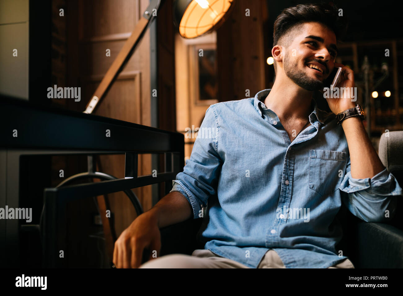 Handsome young men talking in hi-res stock photography and images - Alamy