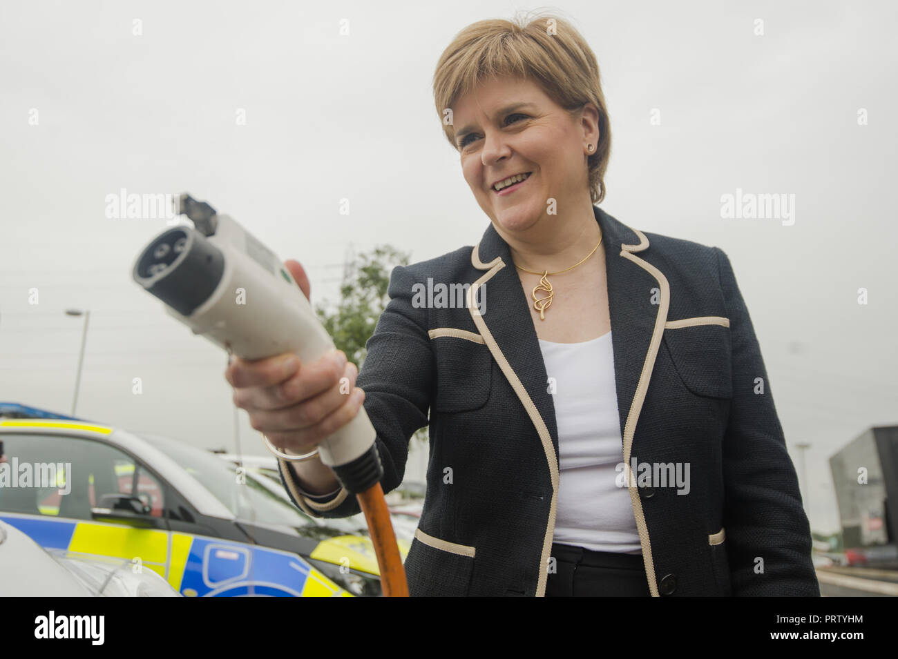 Scottish First Minister views a selection of electric vehicles from the